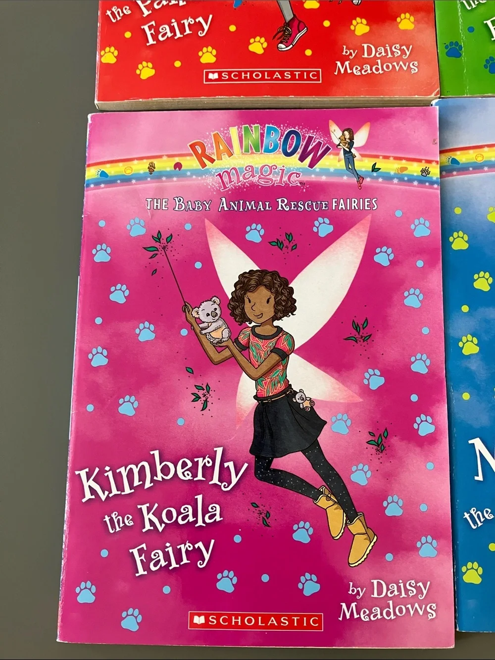 Scholastic Rainbow Magic Mae the Panda Fairy - Red and Yellow Cover